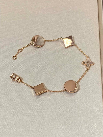 [Lumina]STAR AND SUN 5 MOTIF MOP PINK GOLD BRACELET