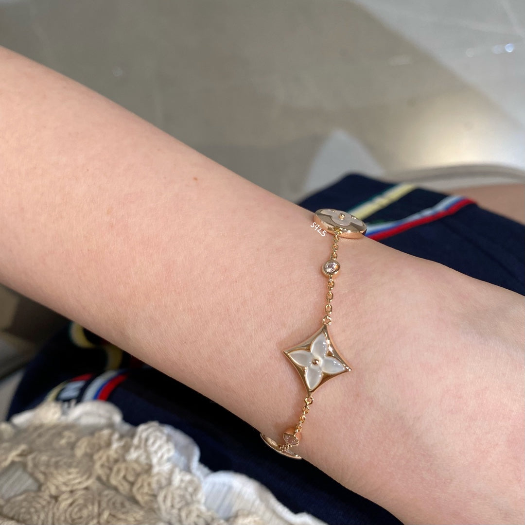[Lumina]STAR AND SUN 4 MOTIF WHITE MOP PINK GOLD BRACELET
