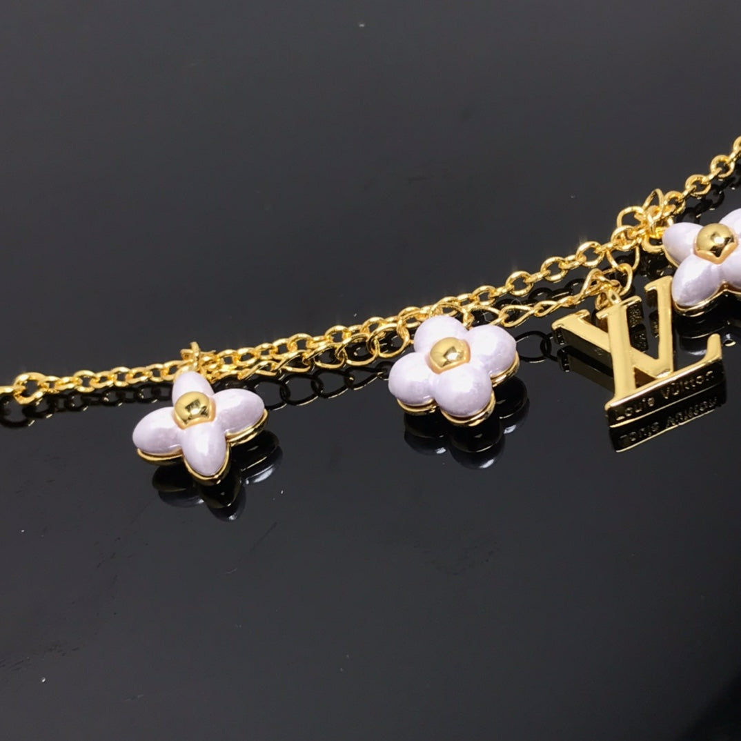 [Lumina]LOGO 6 MOTIF STAR AND SUN GOLD BRACELET